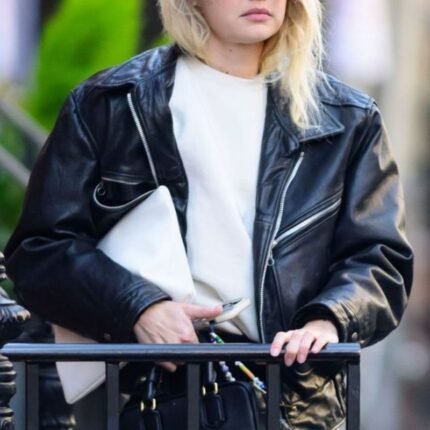 Gigi Hadid wearing black leather jacket, front view