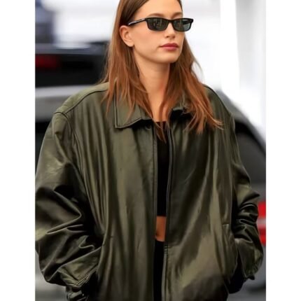 Women’s black leather jacket with front zipper fastening, shirt-style collar, and relaxed fit