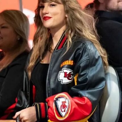 Taylor Swift wearing the Chiefs black leather jacket, close-up front side view