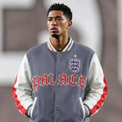 Palace England grey varsity jacket worn by model
