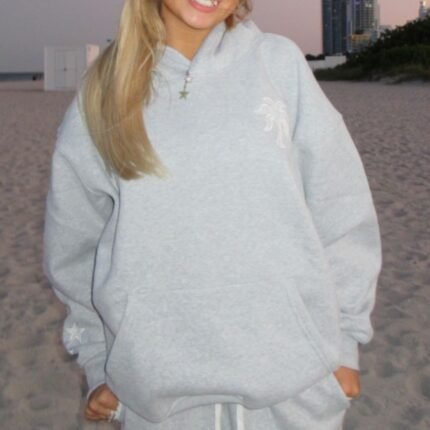 Pink Palm Puff grey hoodie front with hood and kangaroo pocket