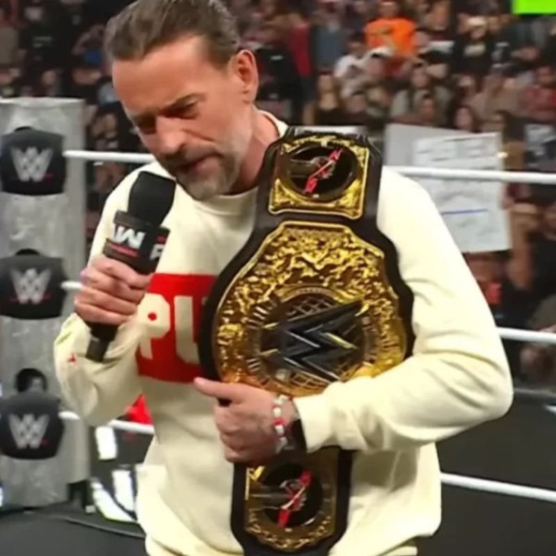 WWE-Monday-Night-Raw-World-Heavyweight-Champion-CM-Punk-White-Sweatshirt-Unisex WWE Monday Night Raw CM Punk White Sweatshirt - Image 1