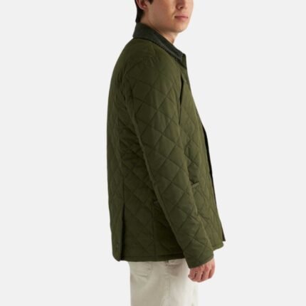 Side view of men’s olive green quilted cotton jacket with regular fit.
