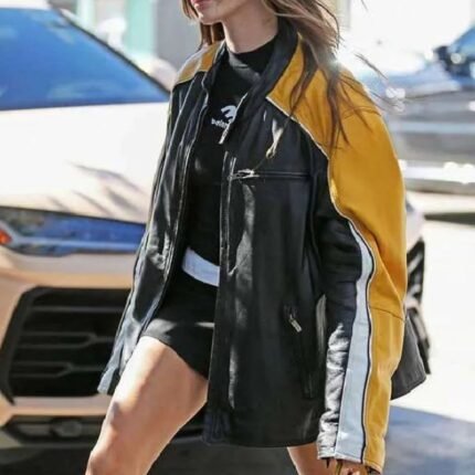 Hailey Bieber's black and yellow moto jacket close-up front view