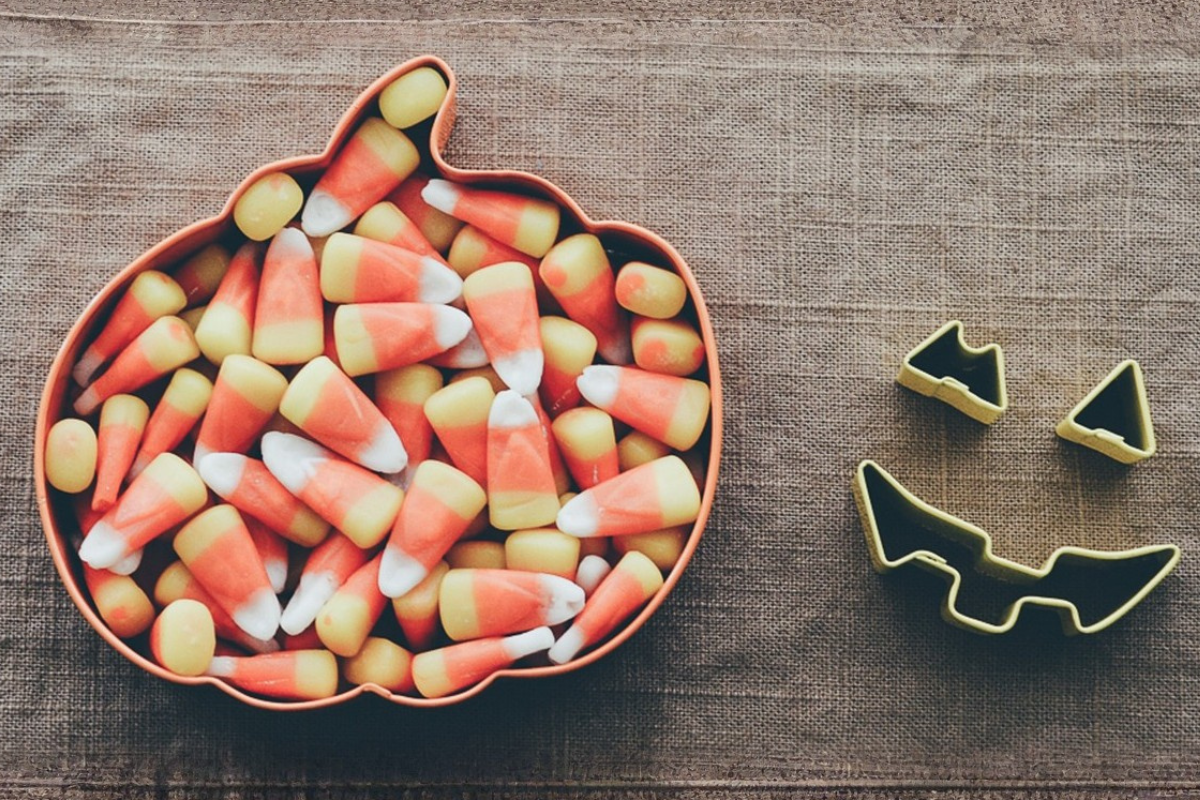 Candy corn in pumpkin bowl for halloween trivia questions and answers