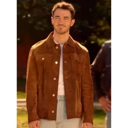 Kevin Jonas wearing a brown suede jacket with a button front and shirt-style collar