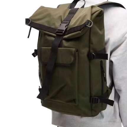 Lucky S01 Anya Taylor-Joy olive green backpack worn over the shoulder