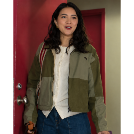 Anh Pham wearing a green workwear jacket with olive and sage panels, zip front, pointed collar, and long sleeves in The Love Hypothesis.