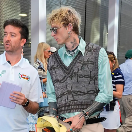 Machine Gun Kelly grey sweater vest front view