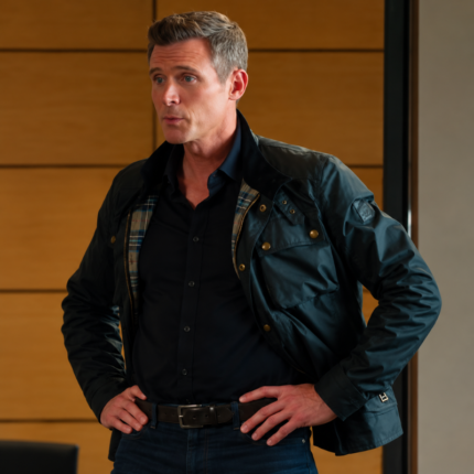 Charlie Hudson Season 9 Icon Jacket modeled with navy utility design and gold-tone buttons