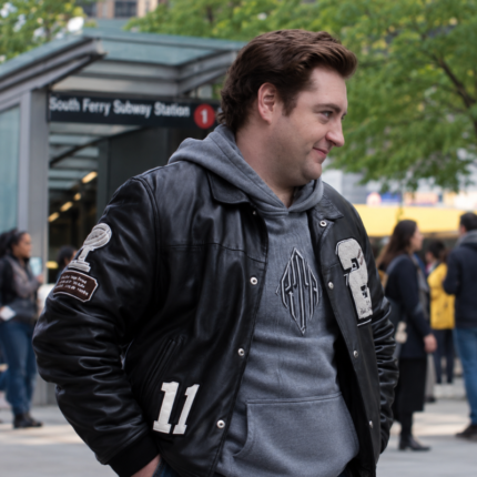 Daniel Blake Wearing a Black Varsity Leather Jacket with Number 11 Patches