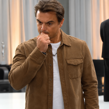 Man wearing the Wyatt Spencer inspired brown suede jacket over a white T-shirt, featuring a classic collar, button front, and flap chest pocket.