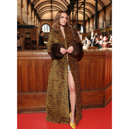 Zoey Deutch wearing a golden brown leopard print floor-length coat